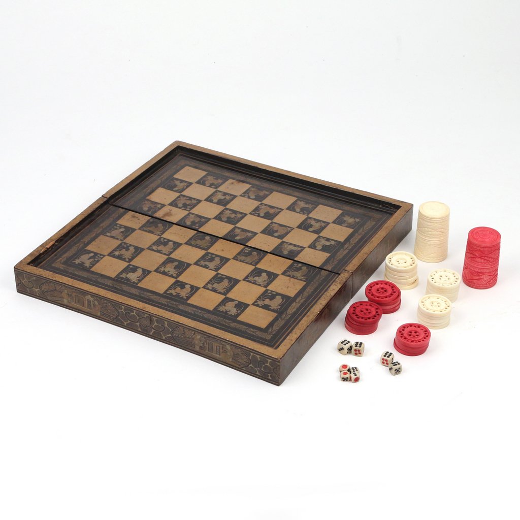 CHINESE EXPORT GAME SET: CHINESE EXPORT GAME SETearly 20th Century, lacquered with various scenes and figures, having a checker-board top and backgammon interior, with 30 carved and stained checker / backgammon pieces, two di