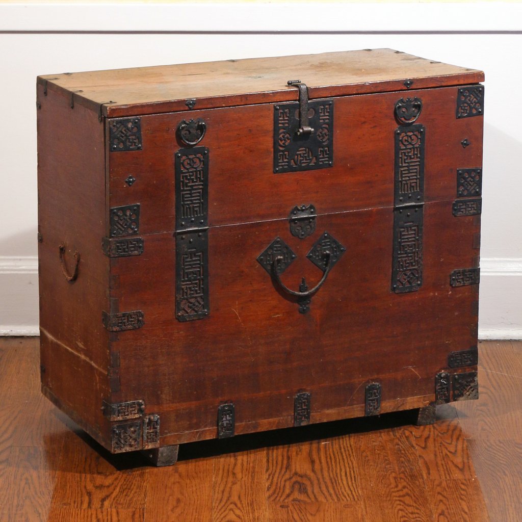 JAPANESE TANSU CHEST: JAPANESE TANSU CHEST19th Century, having pierced iron hinges and hardware with swastika motifs; h. 29" w. 32" d. 16"