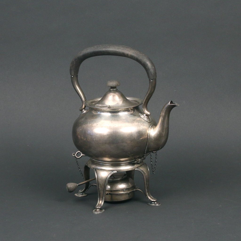 STERLING SILVER TEA KETTLE: STERLING SILVER TEA KETTLEby McAuliffe & Hadley, on stand with burner, h. 10-1/2 in. (over handle), 30 toz