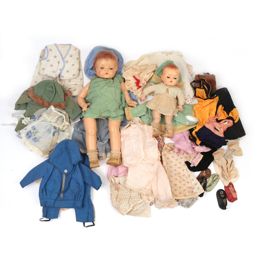 TWO VINTAGE DOLLS & CLOTHING: TWO VINTAGE DOLLS & CLOTHINGincluding an Effanbee 'Patsy Ann' doll, appx. 19 in. (with cracks on head); a smaller composition doll; plus various pieces of doll clothing