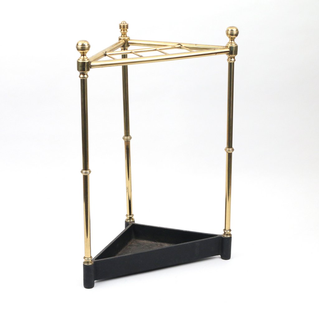 BRASS & IRON UMBRELLA STAND: BRASS & IRON UMBRELLA STANDearly 20th Century, of corner-design, h. 24 w. 16-1/2 d. 9 in.