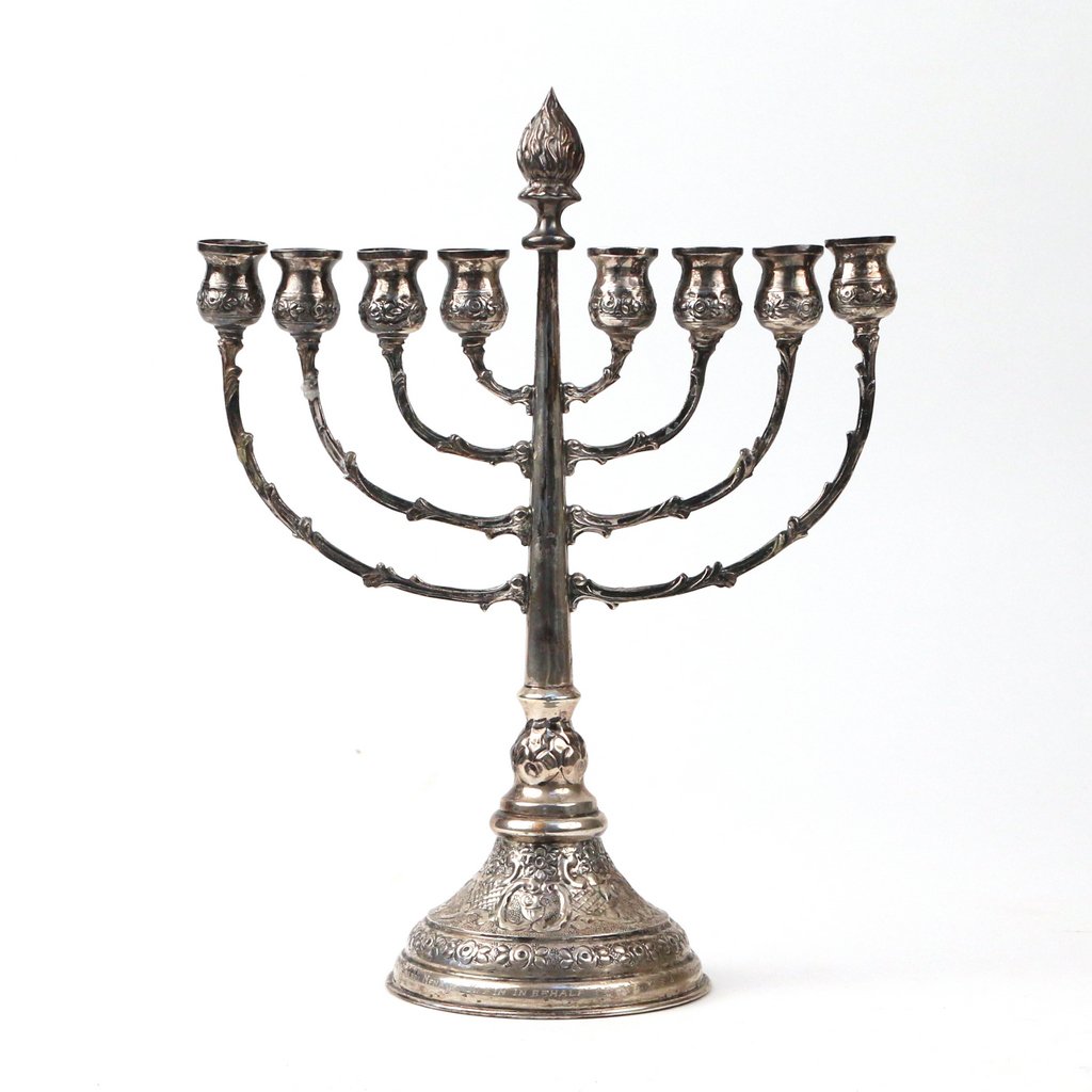 ISRAELI '800' SILVER MENORAH: with classical designs delineated in repousse, inscribed 'From Rabbi Menashe Klein in Behalf of the U.S.A. Citizens Kiryat Zanz - Israel', h. 11-1/2 in., 8 toz