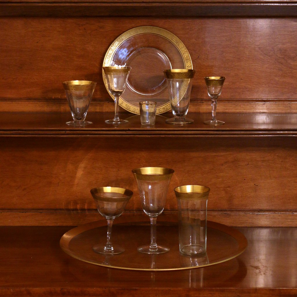 (65pc) ASSORTED SET OF GILT STEMWARE: including 12 plates, 8 tall wine, 10 white wine, 11 beakers, 4 port, 7 cordial, 6 cone-shaped tumblers, 5 similar tumblers, tray and measurer