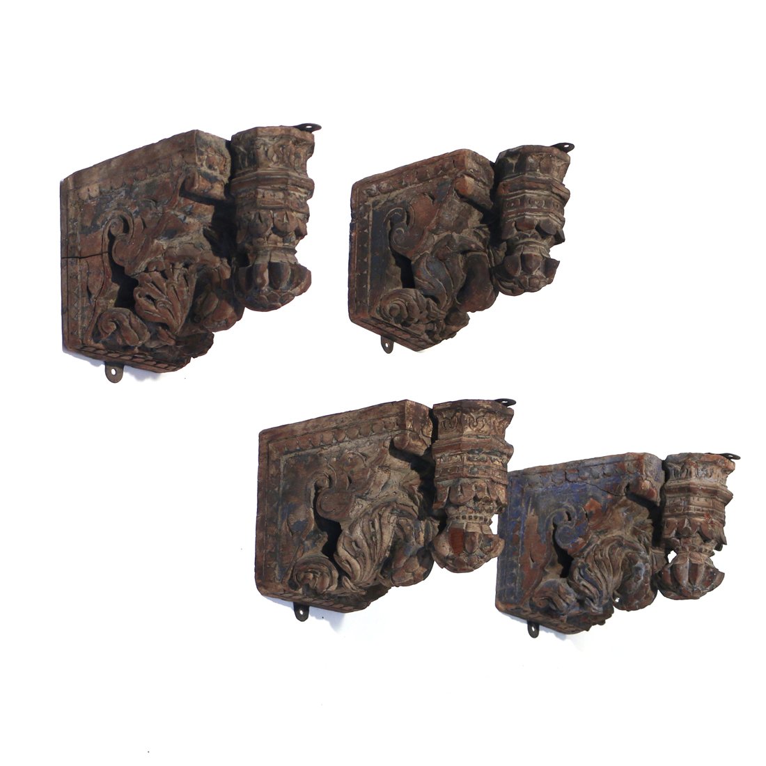 (4pc) CARVED ITALIAN CORBELS: 18th Century or earlier, in the Moorish taste with remnants of polychrome, each appx. 10-1/2 x 5-3/4 in.