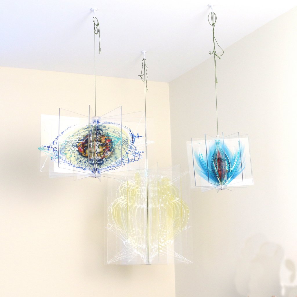 THREE PAINTED AND ENAMELED PLASTIC MOBILES: , Contemporary, height range: 16” - 7”