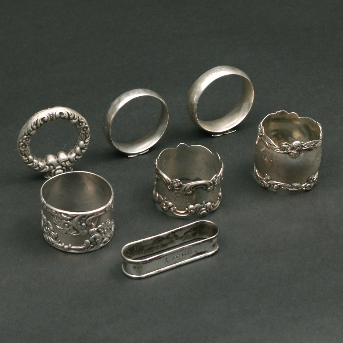 (7pc) STERLING SILVER NAPKIN RINGS: 4 toz total