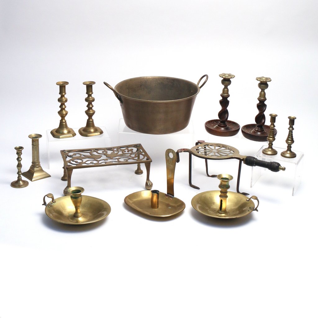 (14pc) VARIOUS BRASS ITEMS: Including a large pot, two pairs of candlesticks, a pair carved wood and brass candlesticks, two single candlesticks, two night sticks, a wall mount candleholder and two trivets
