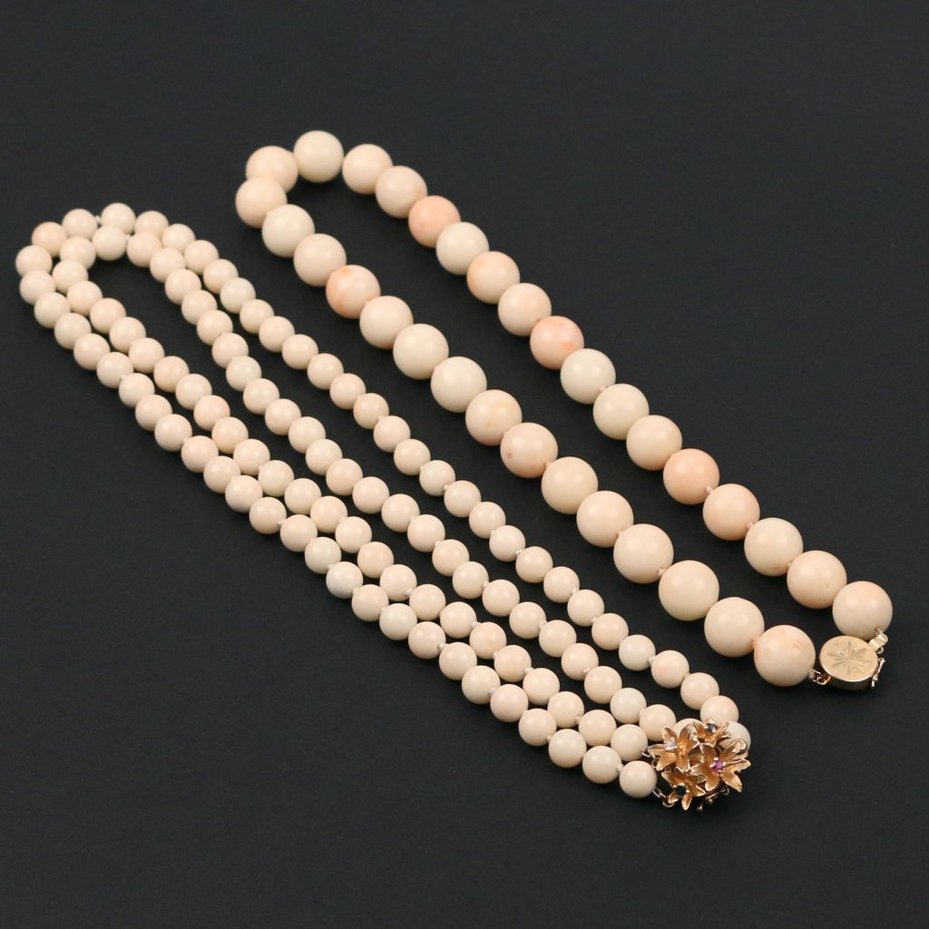 (2pc) WHITE CORAL BEAD NECKLACES: Including a double strand necklace with 14k gold clasp with inset colored stones, 17 in.; and a single strand necklace with a 14k gold clasp, 16-1/2 in.