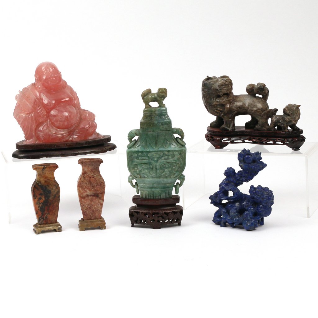 (6pc) MISC. CHINESE HARD STONE CARVINGS: Including an archaistic covered urn on stand, (h.8-1/2 in.); a rose quartz figure of Hotei; a lapis lazuli foo dog group; a soap stone foo dog group; and a pair of mottled stone urns