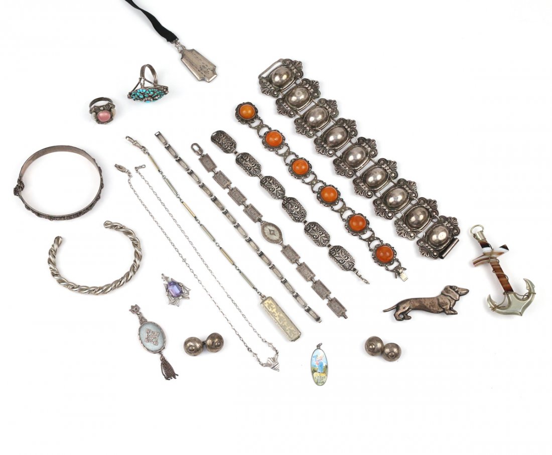 (18pc) SILVER JEWELRY: Including an amber cabochon bracelet, a Scottish banded agate anchor pin, a cuff bracelet, four various link bracelets, a silver plated cuff bracelet, a watch fob belt clip, a pair of cufflinks, an en