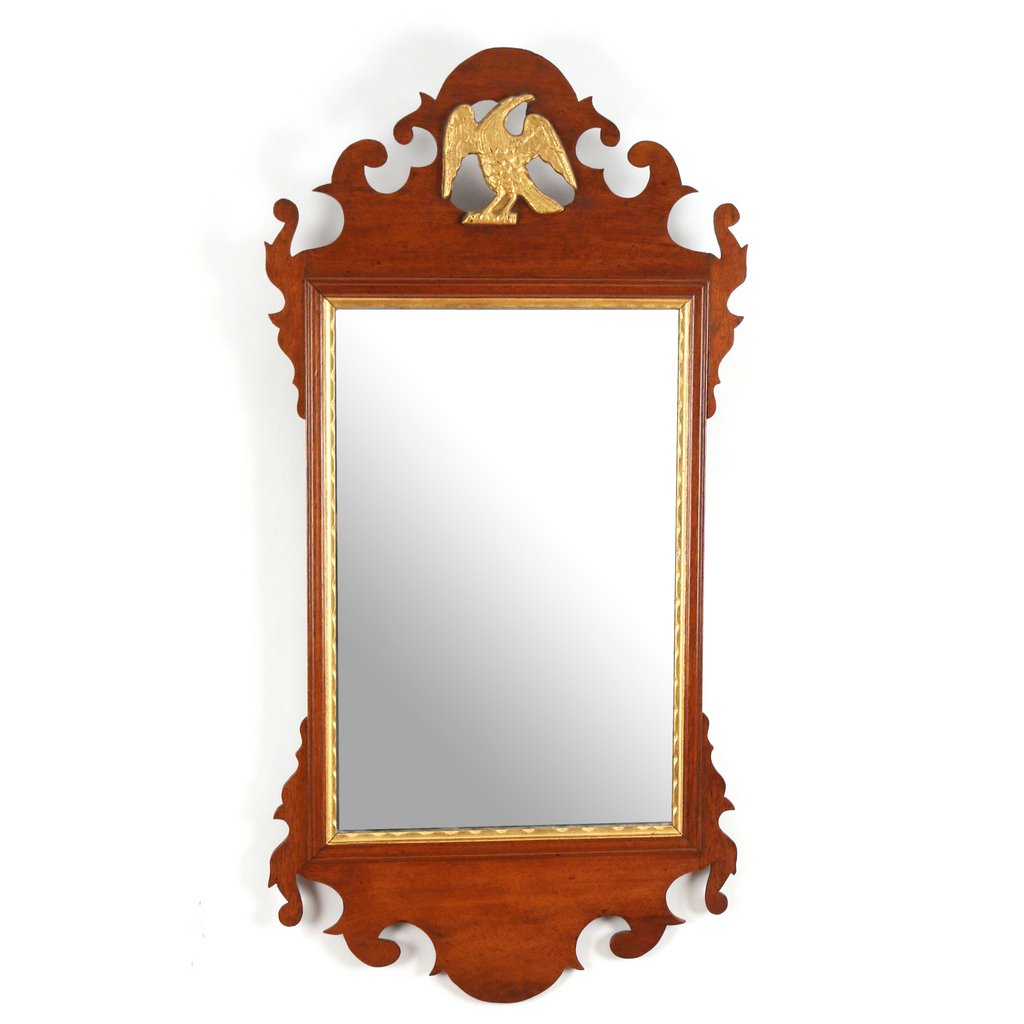 MAHOGANY FRETWORK WALL MIRROR: 19th Century, with a gilt eagle in a round reserve, 33 x 16-1/2 in.