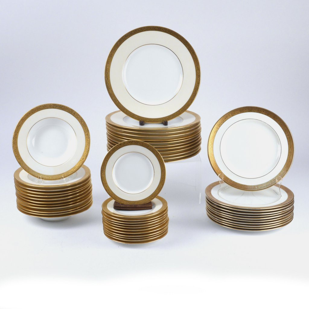 (47pc) GILT MINTON CHINA SERVICE: Including 36 pieces in the "Buckingham" pattern, including 12 service plates, d. 10-1/8 in.; 12 bowls; and 12 bread plates; plus 11 similar Shelley salad plates