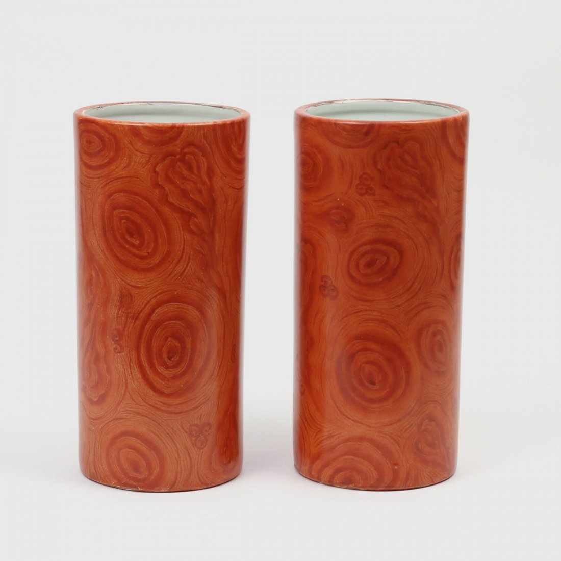 PAIR CHINESE FAUX-BOIS PORCELAIN HAT STANDS: late 19th/early 20th Century, of cylindrical shape with gilt interior rims, with apocryphal stamped Qianlong marks, h. 10-1/2 in.