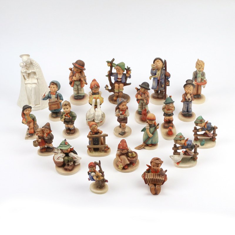 (22pc) HUMMEL PORCELAIN FIGURINES: Depicting children engaged in various activities, mostly full bee's, plus a white Madonna (h. 8-1/8 in.)