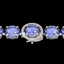 75 CTW Tanzanite & Micro Pave VS/SI Diamond Halo