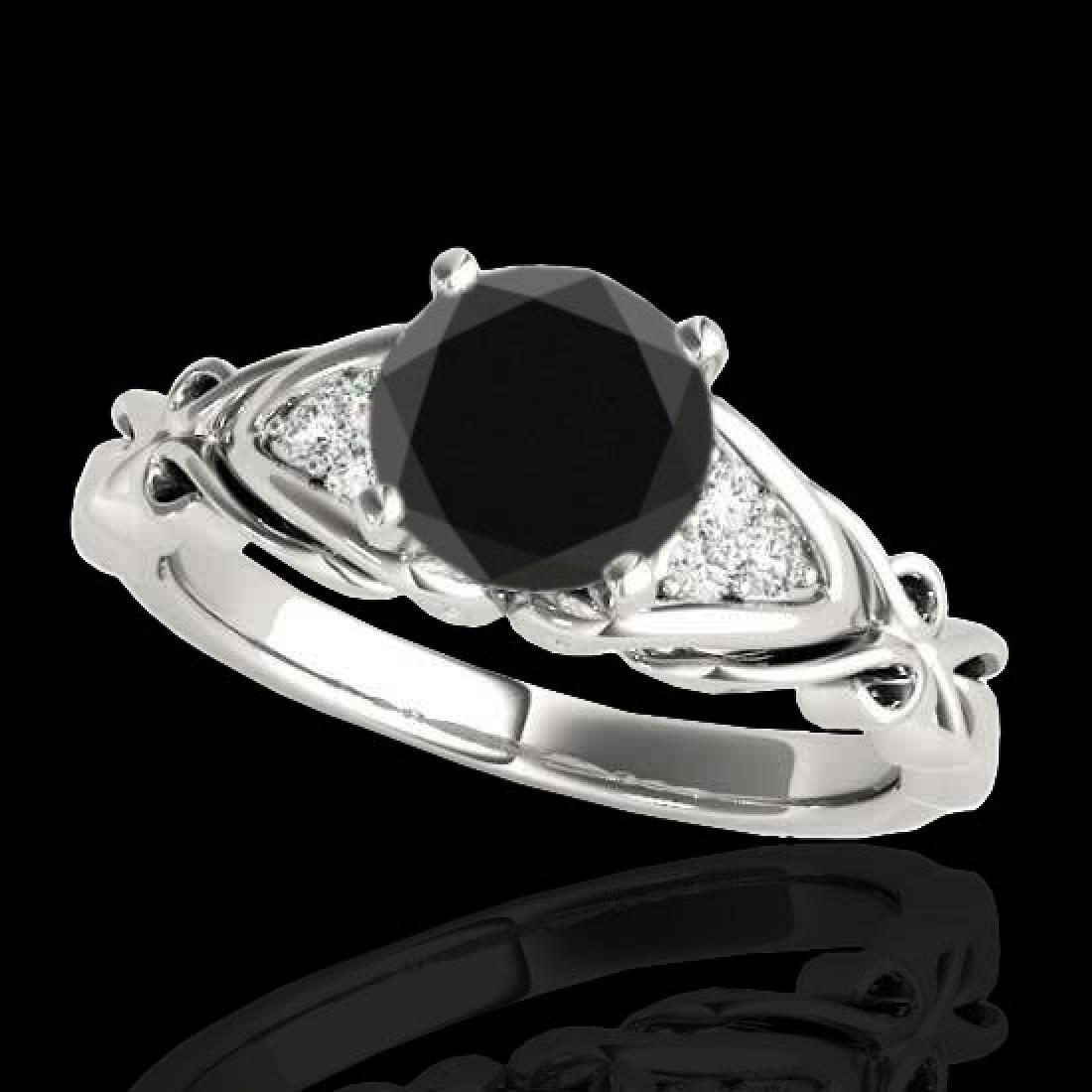 1.1 CTW Certified VS Black Diamond Solitaire Ring 10K: REF-50T9M -35203 ---- 1.1 CTW Certified VS Black Diamond Solitaire Ring 10K White Gold ---- Luxury Designer Brand Ring Appraised at $3,100 Certificate Number US35203 10k White gold, Ring Size is 7, Ri