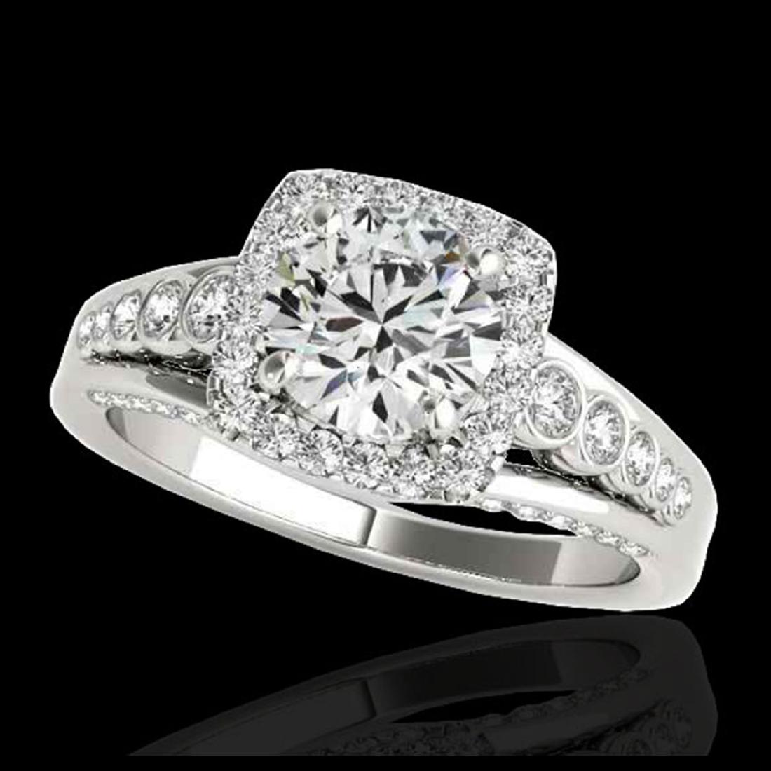 2 ctw H-SI/I Diamond Solitaire Halo Ring 10K White Gold: REF-231R8K - SKU:34319 ---- 2 ctw H-SI/I Diamond Solitaire Halo Ring 10K White Gold Designer Brand Luxury Jewelry, made in the USA Suggested Retail Price: $18,700 Factory offers perfect factory sizing