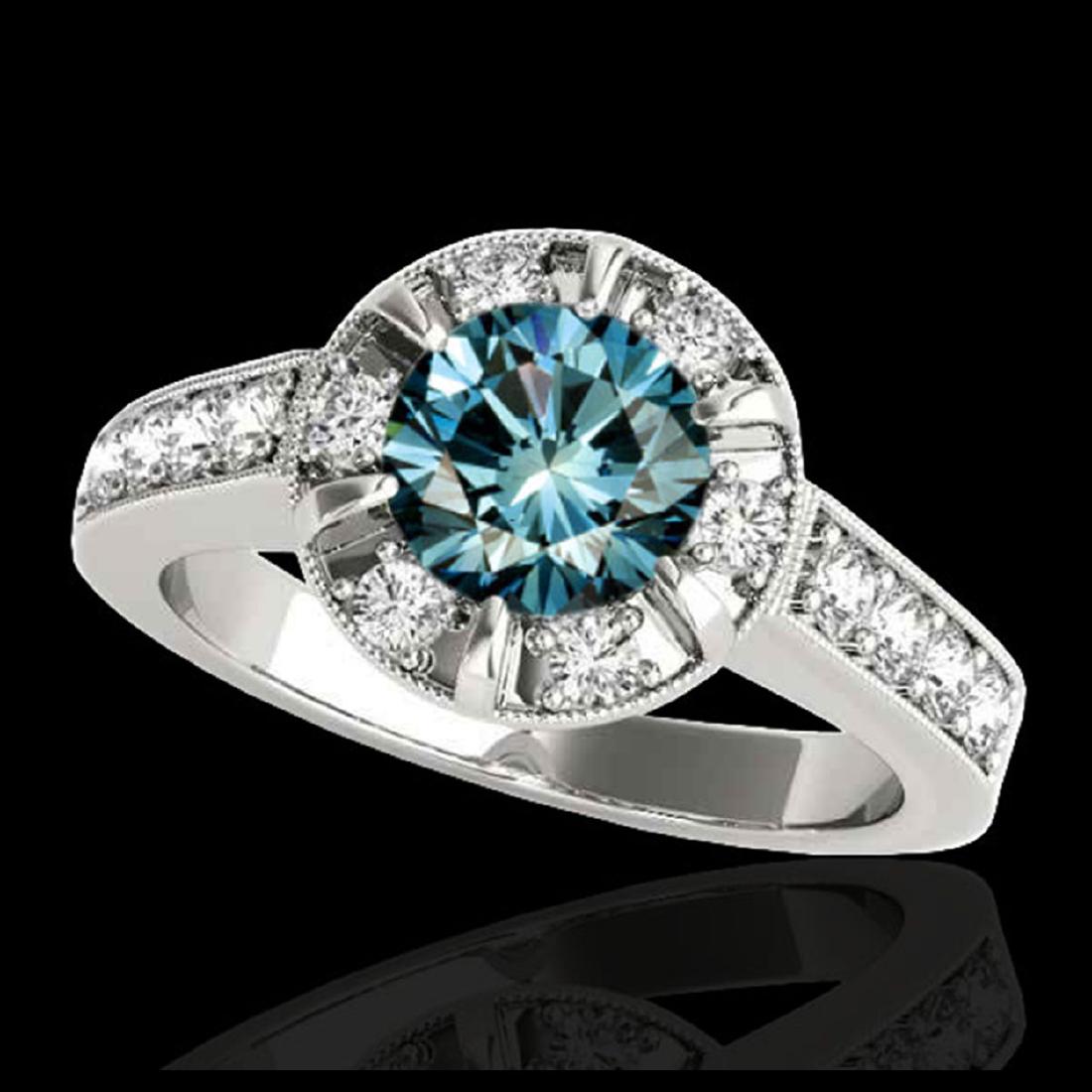 2 ctw SI Fancy Blue Diamond Solitaire Halo Ring 10K: REF-177R3K - SKU:34491 ---- 2 ctw SI Fancy Blue Diamond Solitaire Halo Ring 10K White Gold Designer Brand Luxury Jewelry, made in the USA Suggested Retail Price: $15,600 Factory offers perfect factory