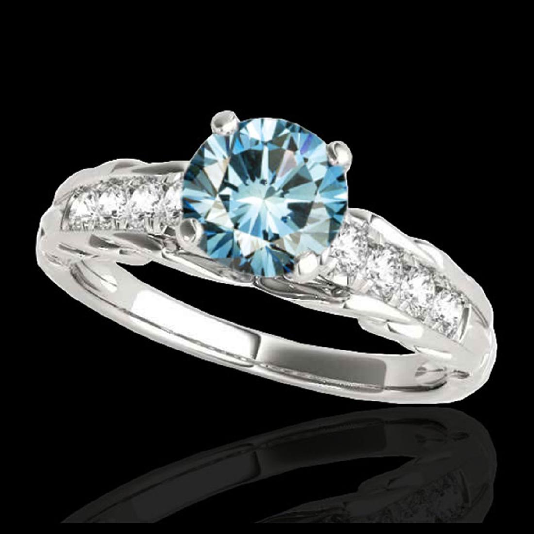 1.20 ctw SI Fancy Blue Diamond Solitaire Ring 10K White: REF-118W6H - SKU:34939 ---- 1.20 ctw SI Fancy Blue Diamond Solitaire Ring 10K White Gold Designer Brand Luxury Jewelry, made in the USA Suggested Retail Price: $9,550 Factory offers perfect factory si