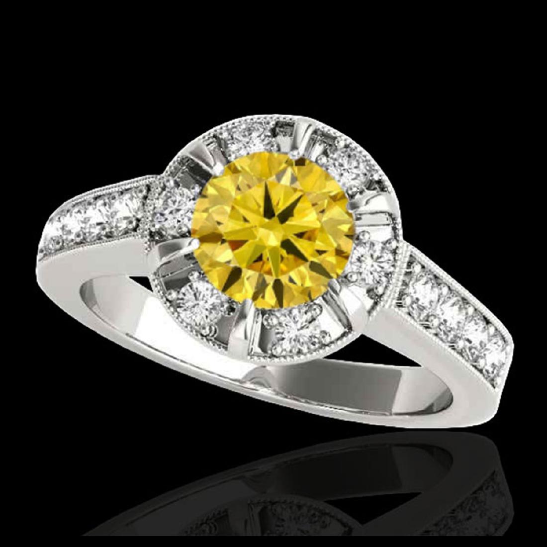 2 ctw SI/I Fancy Intense Yellow Diamond Halo Ring 10K: REF-177Y3X - SKU:34493 ---- 2 ctw SI/I Fancy Intense Yellow Diamond Halo Ring 10K White Gold Designer Brand Luxury Jewelry, made in the USA Suggested Retail Price: $14,300 Factory offers perfect facto