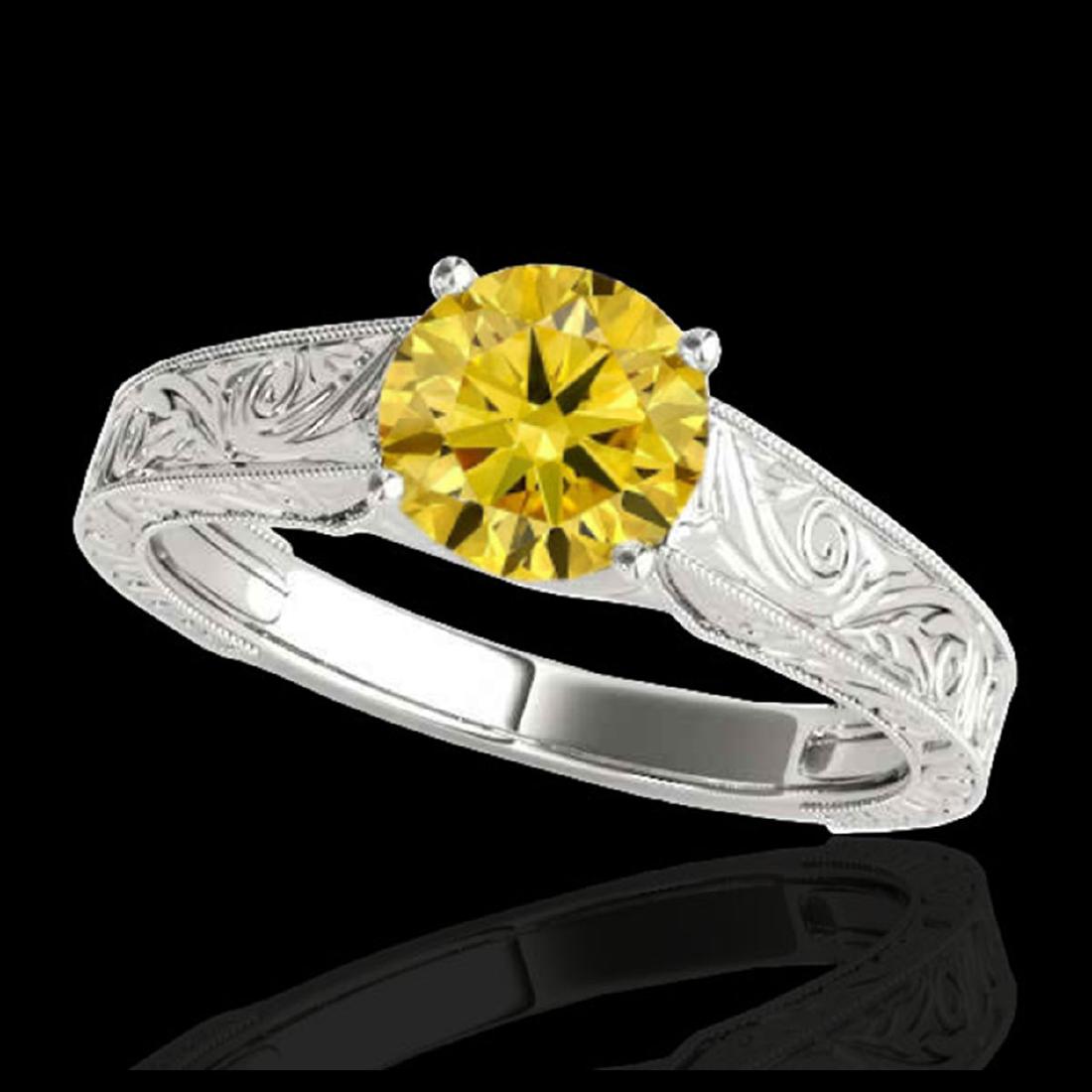 1 ctw SI/I Fancy Intense Yellow Diamond Ring 10K White: REF-114A5V - SKU:35189 ---- 1 ctw SI/I Fancy Intense Yellow Diamond Ring 10K White Gold Designer Brand Luxury Jewelry, made in the USA Suggested Retail Price: $10,100 Factory offers perfect factory si