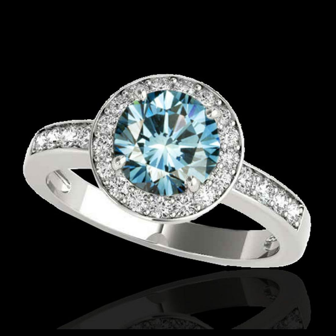 1.40 ctw SI Fancy Blue Diamond Solitaire Halo Ring 10K: REF-129F5N - SKU:34347 ---- 1.40 ctw SI Fancy Blue Diamond Solitaire Halo Ring 10K White Gold Designer Brand Luxury Jewelry, made in the USA Suggested Retail Price: $10,450 Factory offers perfect fact