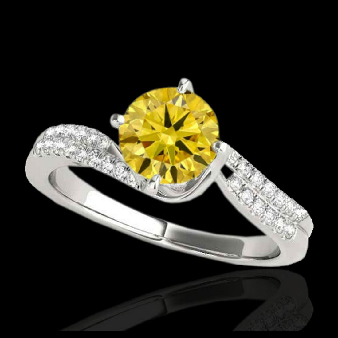 1.20 ctw SI Fancy Yellow Diamond Bypass Ring 10K White: REF-121N4A - SKU:35112 ---- 1.20 ctw SI Fancy Yellow Diamond Bypass Ring 10K White Gold Designer Brand Luxury Jewelry, made in the USA Suggested Retail Price: $10,700 Factory offers perfect factory si
