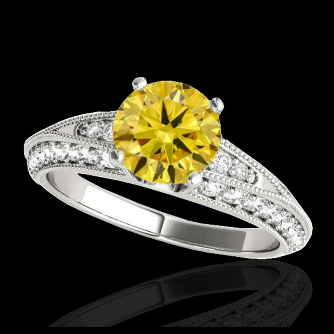 1.58 ctw SI Intense Yellow Diamond Ring 10K White Gold: REF-129M5F - SKU:34628 ---- 1.58 ctw SI Intense Yellow Diamond Ring 10K White Gold Designer Brand Luxury Jewelry, made in the USA Suggested Retail Price: $11,400 Factory offers perfect factory sizing,