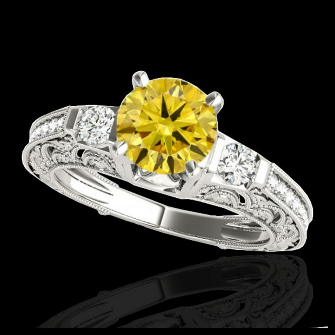 1.63 ctw SI Intense Yellow Diamond Ring 10K White Gold: REF-163Y6X - SKU:34655 ---- 1.63 ctw SI Intense Yellow Diamond Ring 10K White Gold Designer Brand Luxury Jewelry, made in the USA Suggested Retail Price: $14,400 Factory offers perfect factory sizing,
