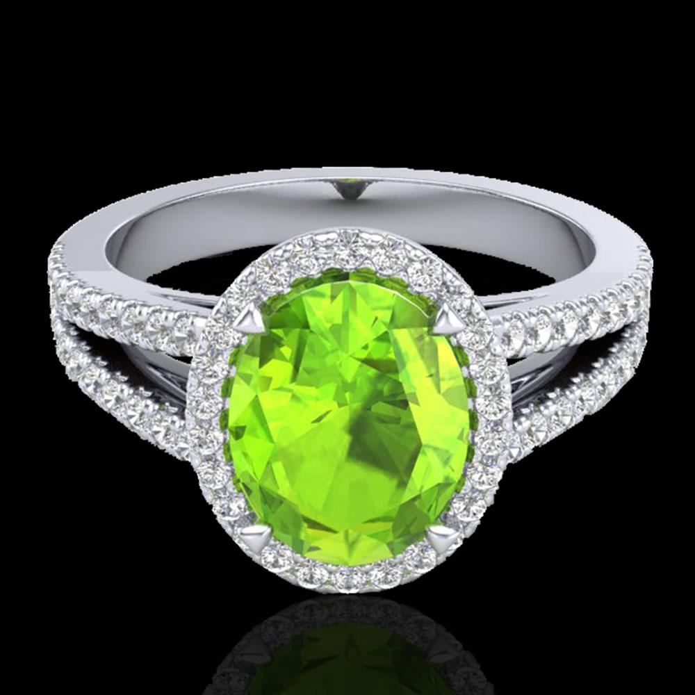 3 ctw Peridot & Micro VS/SI Diamond Halo Solitaire Ring: REF-55H9W - SKU: 20945 ---- 3 ctw Peridot & Micro VS/SI Diamond Halo Solitaire Ring 18K White Gold Designer Brand Luxury Jewelry, made in the USA Suggested Retail Price: $5,150 Factory offers perfect 