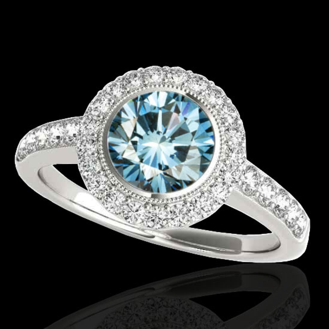 1.5 CTW Si Certified Fancy Blue Diamond Solitaire Halo: 34446-REF-180N2Y ---- 1.5 CTW Si Certified Fancy Blue Diamond Solitaire Halo Ring Gold Manufacturer's Suggested Retail Price: $8900.00 GEMMARI Designer Brand Luxury Jewelry, made in the USA GEMMARI Re