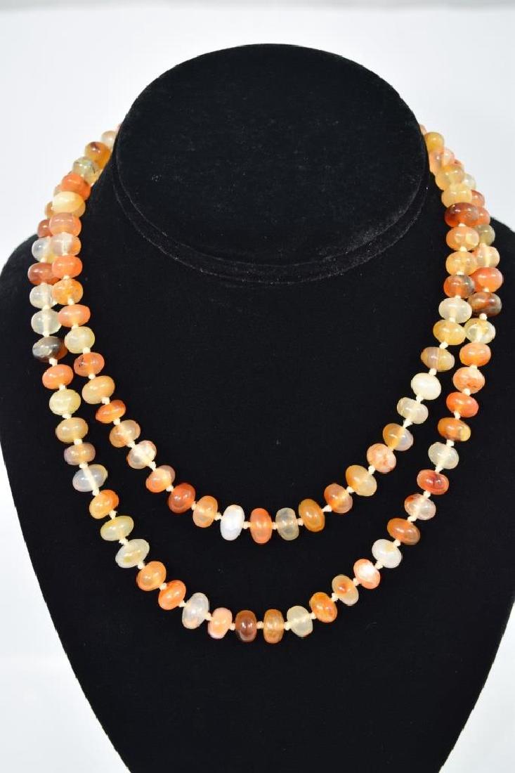 BEAUTIFUL VINTAGE CARNELIAN BEADED NECKLACE: Vintage carnelian necklace with beautiful examples of the variations of carnelian. Beads approximately 9mm, necklace 32" L. Weighs 70g. SHIPPING $15 + INSURANCE.