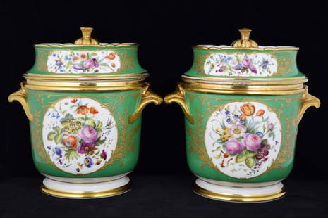 PAIR CONTINENTAL PORCELAIN FRUIT ICE COOLERS: Pair antique English porcelain fruit coolers, well painted floral motif with finely gold gilt on green ground. Gilded knops and finials. Each cooler consists of 3 pieces; cooler, liner, and lid. Measu