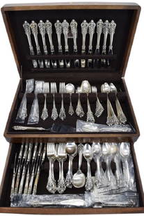 121PCS WALLACE GRANDE BAROQUE STERLING SILVER: Most new, many in original packaging, no monograms. 12 round bowl soup spoons (6-1/8"), 11 dinner forks (7-1/2"), 12 large knives (8-7/8"), 14 iced tea spoons (7-5/8"), 13 salad forks (6-5/8"), 22 tea