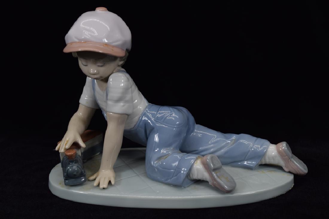 LLADRO 7619 "ALL ABOARD" PORCELAIN FIGURINE (1 of 15)