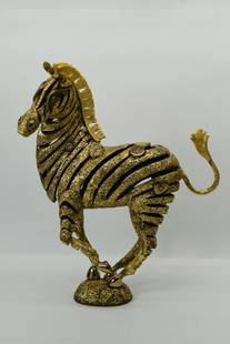 GOLDEN BRONZE ZEBRA SCULPTURE BY JIANG: Limited edition bronze sculpture with gold leaf by Jiang TieFeng. The title is "Zebra". Numbered and signed limited edition 64/225. Measurement approx. 20 ½" H x 15 ½" L x 7" D. Weight 32 lb