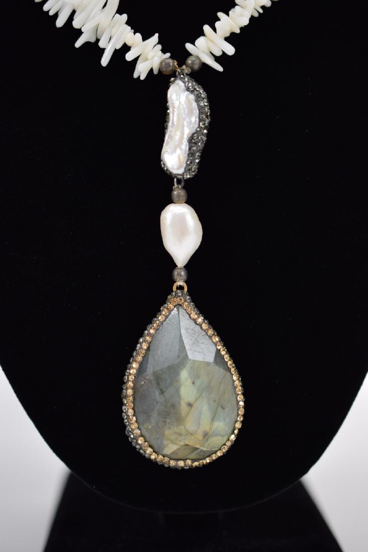 WHITE CORAL NECKLACE & LABRADORITE PENDANT: White coral necklace with pearl and hematite bling discs with a tear drop shaped labradorite pendant. Measures approx. 28” L (plus 4” L pendant and pearl discs) and weighs 64.2g. U.S. SHIP