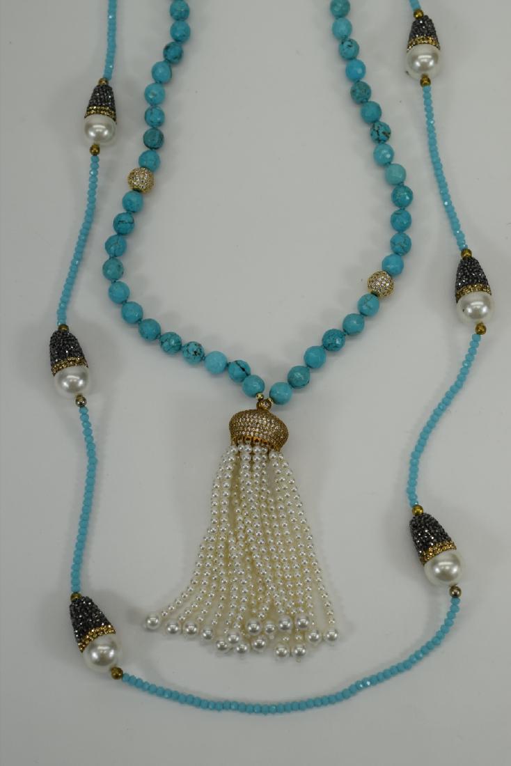 TURQUOISE BEADED NECKLACES W/ PEARL & HEMATITE: Crackle turquoise howlite large beaded necklace with a crown encrusted with clear rhinestones and faux pearl dangling tassels measuring 30” L (plus 3-1/2” pendant). The second of smaller c