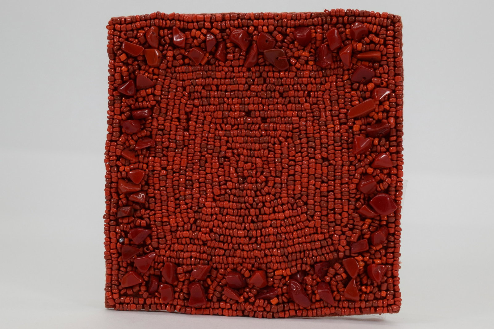 KIM SEYBERT NYC RED BEADED COASTERS: New old stock in original packaging. Each measure 4-1/8" L x 4-1/8" W. Total weight 15oz. U.S. SHIPPING $15 + INSURANCE.