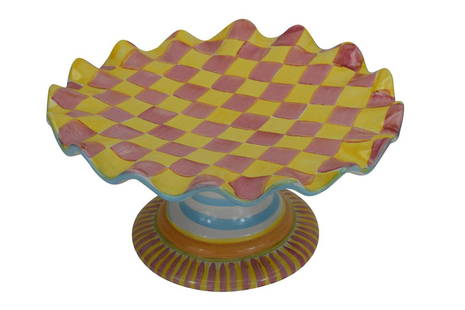 MACKENZIE-CHILDS WALLCOURT IMRIE FLUTED CAKE STAND: Vintage MacKenzie-Childs "Wallcourt Imrie" (rare, retired pattern) fluted cake server stand having pink and yellow checks with a blue ruffled rim. Bare pottery bottom, impressed "Mackenzie-Childs