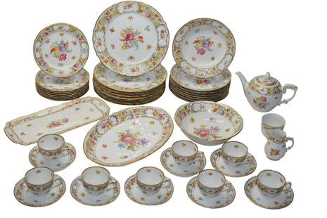 45 PCS. OSCAR DE LA RENTA "ROYALE" DINNER SERVICE: Forty-five piece porcelain China "Royale" by Oscar de la Renta service for eight (8). Discontinued. Osrroy pattern, multi-floral rim and center, scalloped. All pieces are marked "Oscar de la Renta",