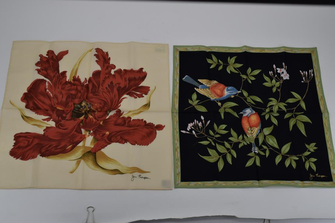 2PCS. JIM THOMPSON COTTON FLORAL HANDKERCHIEFS: One black with birds, and one beige with red floral motif. Both signed "Jim Thompson" to corner. Each measure approximately 15" L x 15" W. U.S. PRIORITY SHIPPING $15 + INSURANCE.