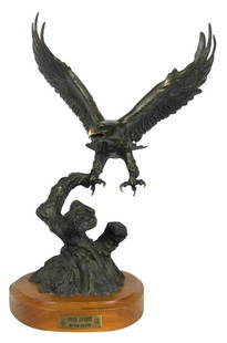 CARL WAGNER 'FREE SPIRIT' BRONZE SCULPTURE: Carl Wagner (American, 1938-2011) bronze sculpture of an eagle. Signed, numbered 35/50, dated 1986 and titled to bronze base. Measures 19" height + 1 3/4" wood base. THIRD PARTY SHIPPING REQUIRED.