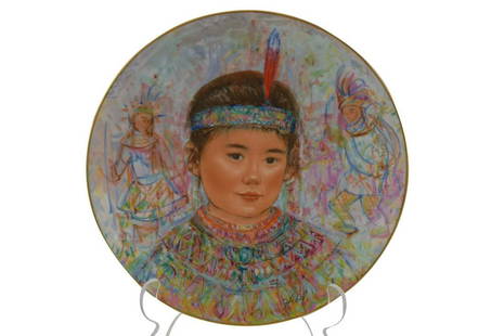 EDNA HIBEL NOBILITY OF CHILDREN PLATE IN BOX 2: Hutschenreuther Germany porcelain wall art hanging plate "Chief Red Feather"(#4446/12750) in original presentation box with certificate. Plate measures 9-3/4". Box measures 11-3/4"L x 11-3/4"W x 1-1/2