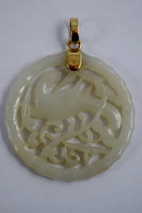 14K GOLD WHITE JADE PHOENIX BIRD CARVING PENDANT: Beautifully carved white jade (perhaps mutton fat) phoenix, plants and bamboo border. "14K" & "585" hallmarked bail. Purchased 50 years ago in China. Measures 2 1/4" (5.7cm) in diameter. Weighs