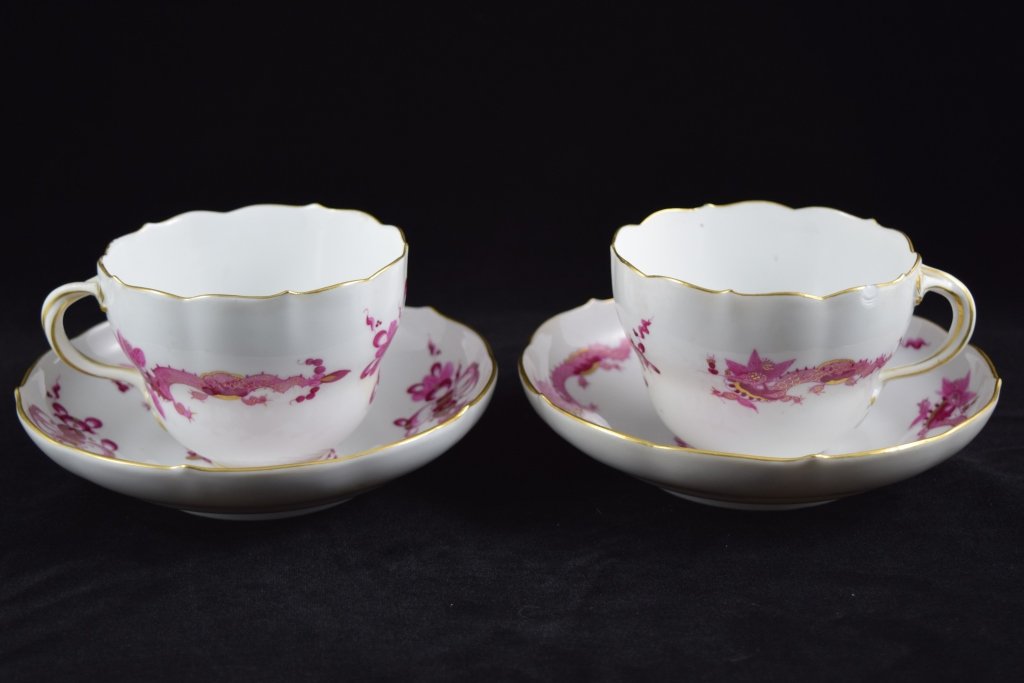 PAIR MEISSEN GERMAN PORCELAIN PINK CUP & SAUCER: 1924-1934. Court Dragon/Hoo Hoo Cocks design with pink and gold accents. V 0,30 l. Pfeiffer Mark (the director/manager of the Meissen company from 1924-1934). 2 coffee cups, each measure 4" (10.2cm) l