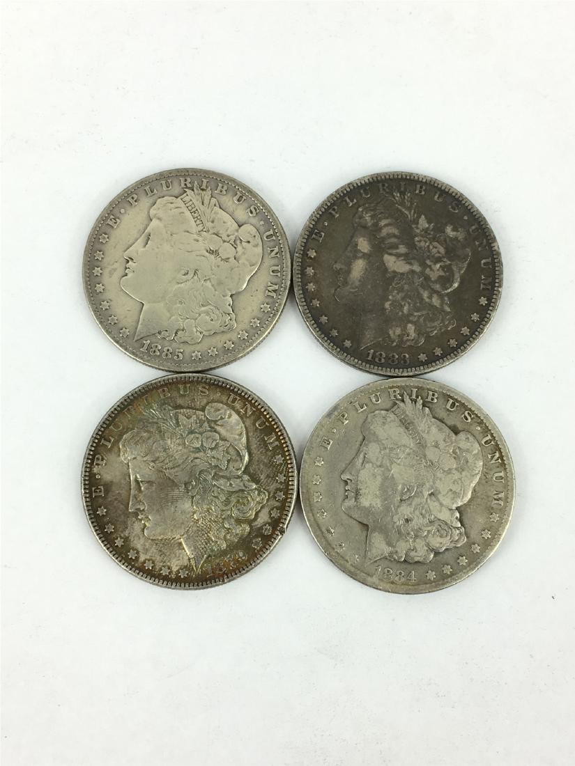 FOUR US DOLLAR SILVER COINS: FOUR US DOLLAR SILVER COINS. Domestic shipping $5 and oversea $20. Combined shipping available. We accept pre-sale offer, phone bidding and post sale offer.