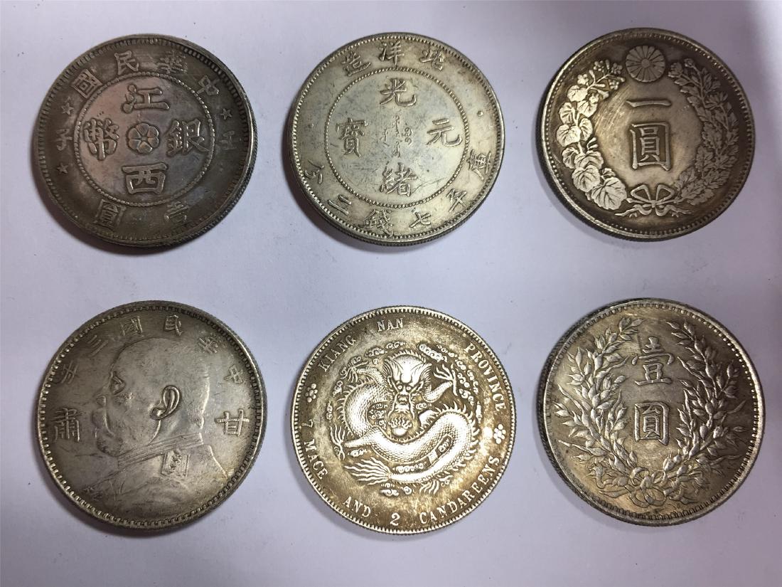 SIX CHINESE DOLLAR COINS REPUBLIC PERIOD: SIX CHINESE DOLLAR COINS REPUBLIC PERIOD. Each weight around 26.5 gram. Domestic shipping $5 and oversea $10. Combined shipping available. We accept pre-sale offer, phone bidding and post sale offer. 