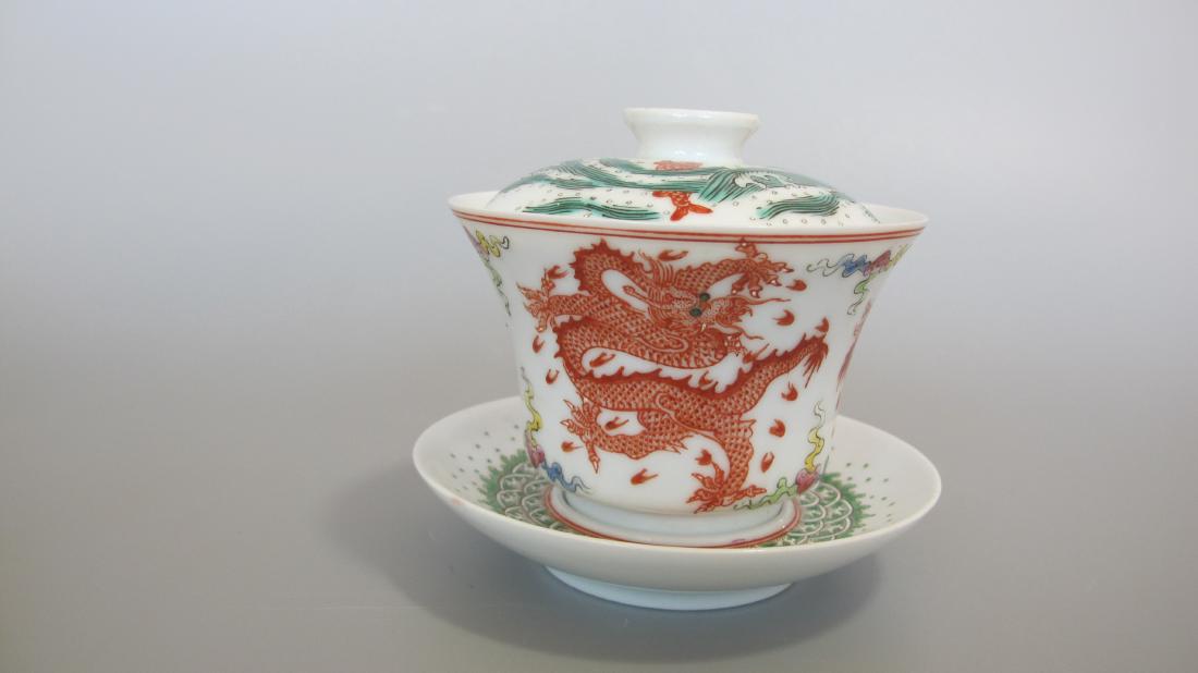 CHINESE PORCELAIN FAMILLE ROSE LIDDED TEA CUP: CHINESE PORCELAIN FAMILLE ROSE LIDDED TEA CUP. Marker on bottom. H. cm. Domestic shipping $20 and oversea $40. Combined shipping available. We accept pre-sale offer, phone bidding and post sale offer.