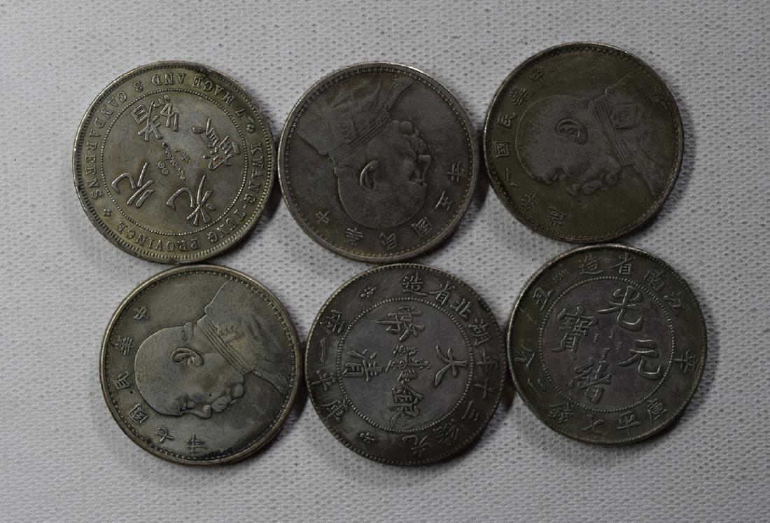 SIX CHINESE DOLLAR COINS: SIX CHINESE DOLLAR COINS. Each weight around 26.5 gram. Domestic shipping $5 and oversea $10. Combined shipping available. We accept pre-sale offer, phone bidding and post sale offer. For buyers from 